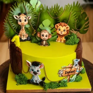 Gâteau vert sur le thème de la jungle avec bébés animaux et chiffre 1